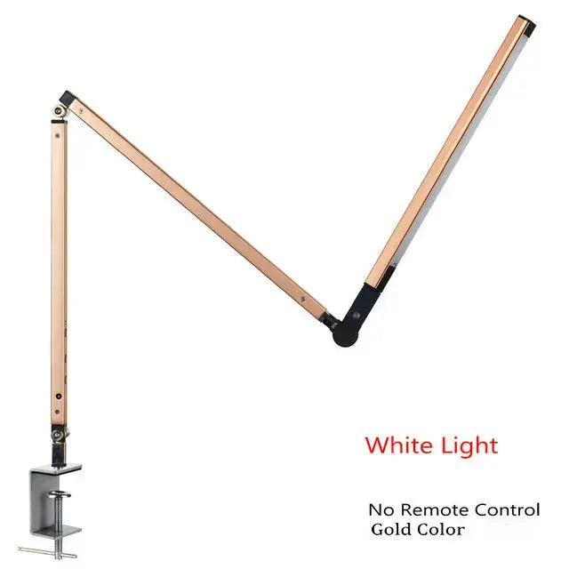 Modern gold-colored decorbites clip led desk lamp with adjustable arm and white light for office reading use