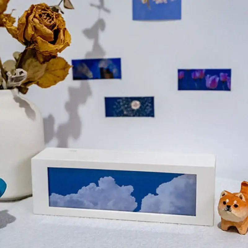 White rectangular shadow box night light displaying blue sky with clouds for modern black cloud night decorbites cloud night light
