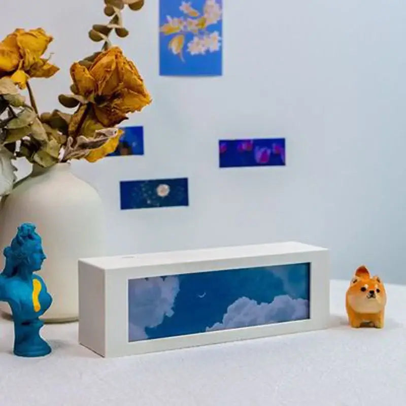 White rectangular shadow box night light with blue sky clouds and moon scene modern decorbites cloud night light