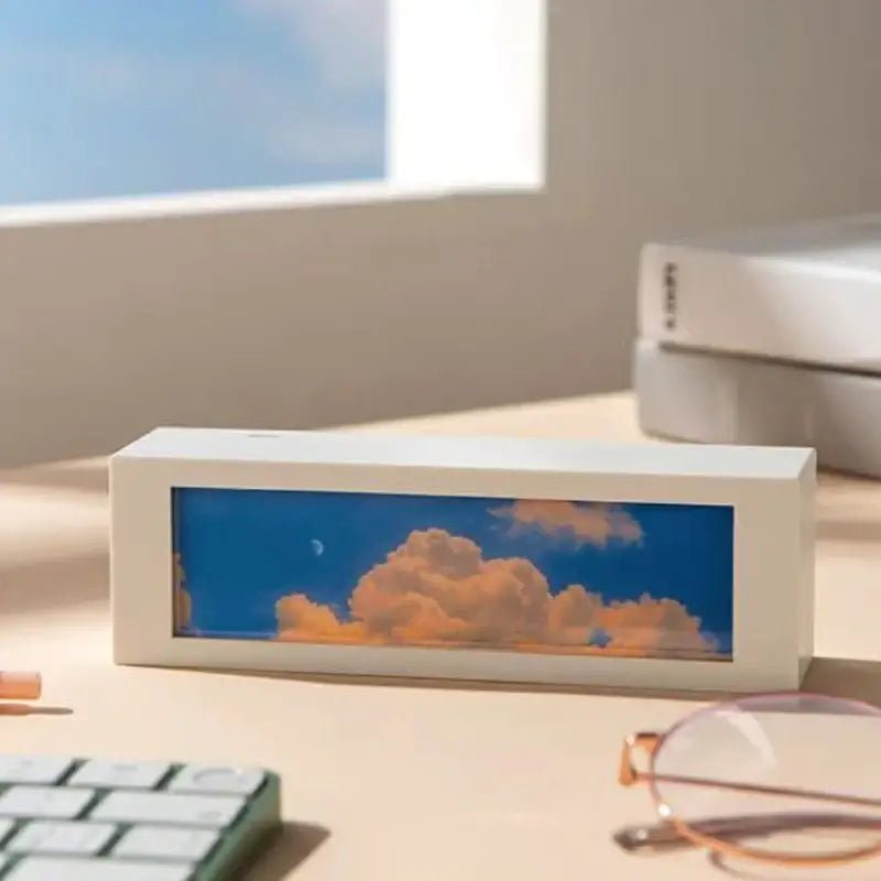 Modern black cloud night light with white rectangular desk lamp displaying vivid blue sky and orange cloud decorbites cloud night