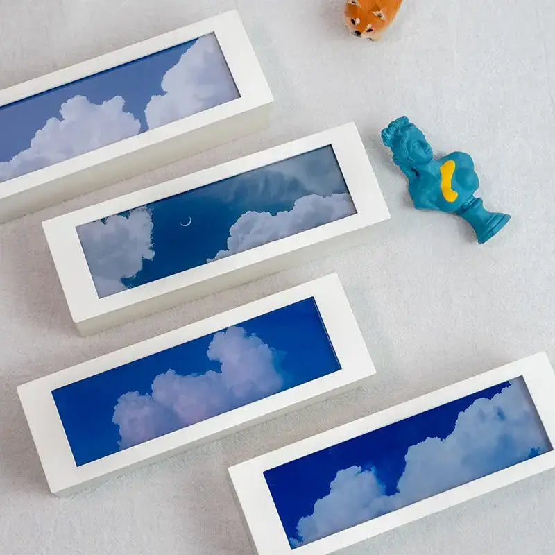 White rectangular shadow box frames with blue sky and cloud scenes for modern black cloud night light decorbites cloud night light
