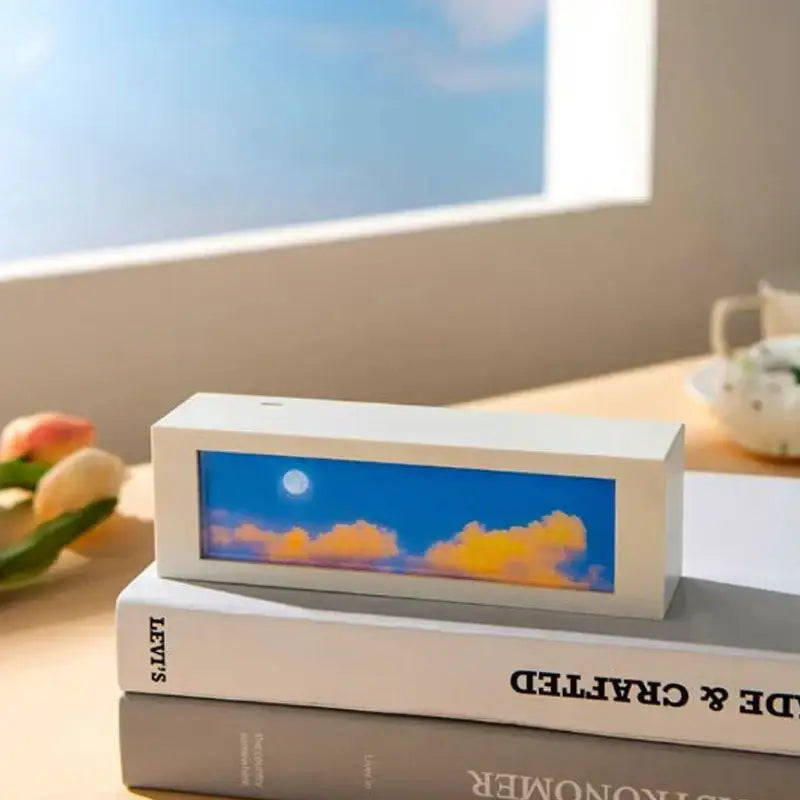 White rectangular led night light with serene blue sky orange clouds and glowing moon for decorbites cloud night decor