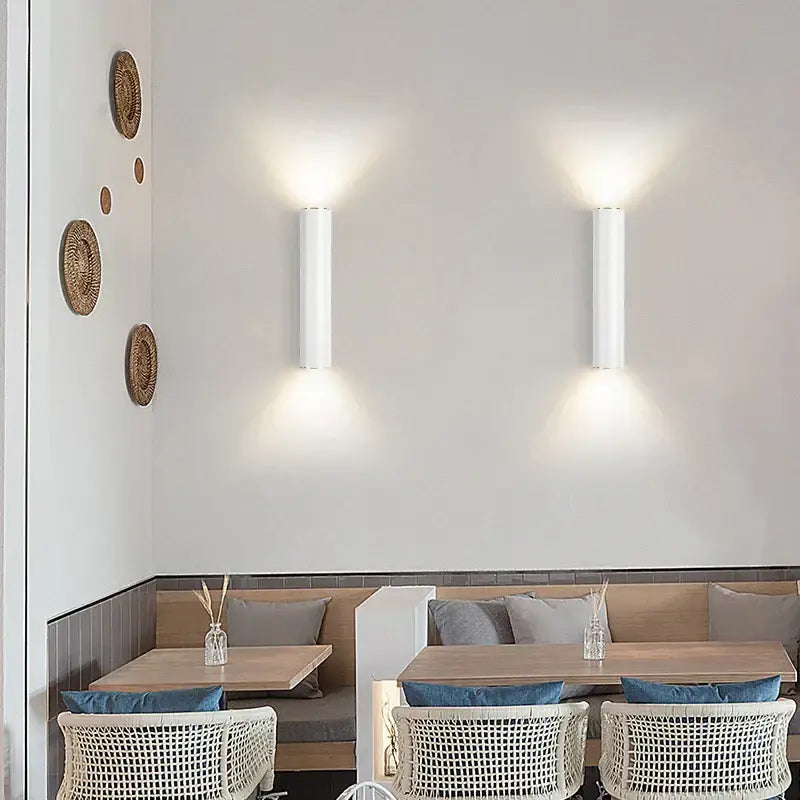 Two sleek cylindrical white cob led wall lamps with modern minimalist design for bedroom decorbites cob led sconce
