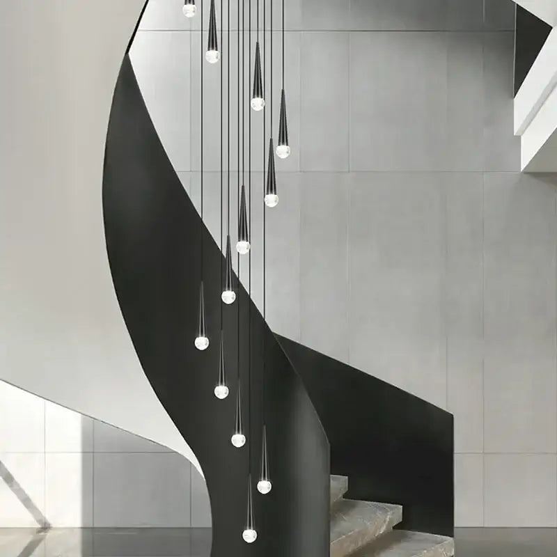 Modern black conical crystal led lighting fixture installed on a sleek metal spiral staircase for decorbites crystal led stair illumination