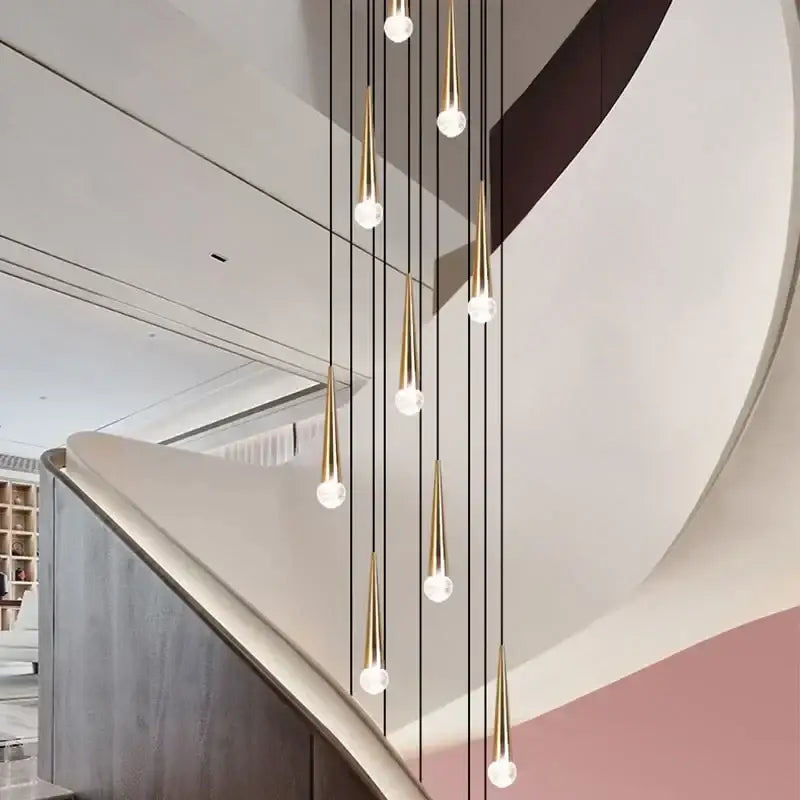 Modern black conical decorbites crystal led chandelier with gold-toned pendant lights and clear spherical bulbs for staircases