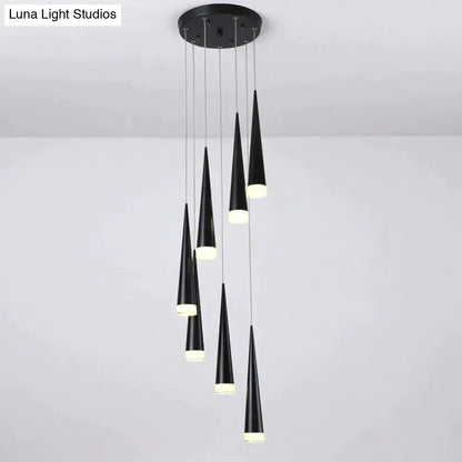Modern black conical led pendant lamp with frosted glass bases hanging from circular ceiling mount for kitchen island