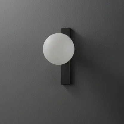 Minimalist black copper wall sconce with frosted white glass globe for modern bedroom decorbites black copper estiluz