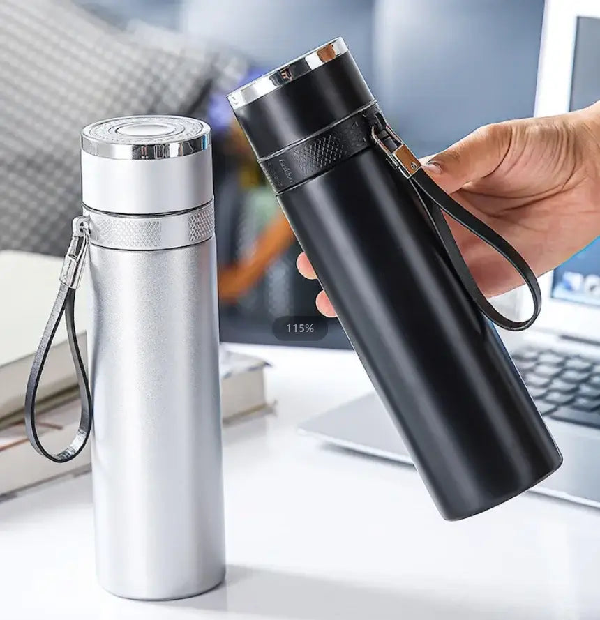 Modern black and cream 400ml stainless steel tumbler with silver and black insulated design and textured caps with wrist straps