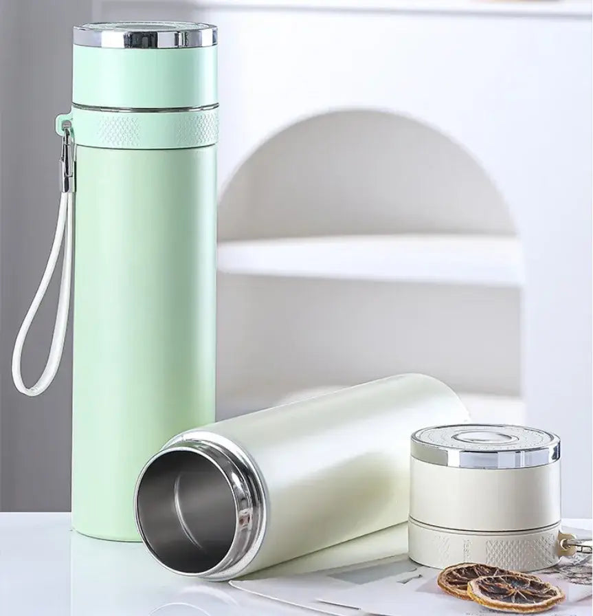 Mint green insulated travel mug with stainless steel lid and white strap 400ml stainless steel vacuum tumbler