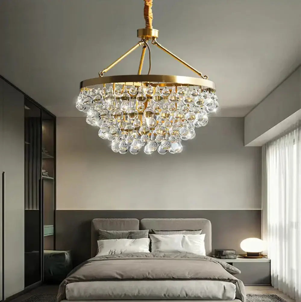 Modern black crystal bead chandelier with gold-toned frame and cascading clear crystal droplets for elegant decorbites black crystal decor