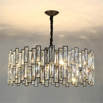 A modern black crystal chandelier with clear faceted crystal bars in dark metal frames for dining room decorbites black crystal