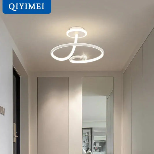 Modern black crystal chandelier featuring a white led ring light with sleek intertwined rings and central crystal by decorbites black crystal