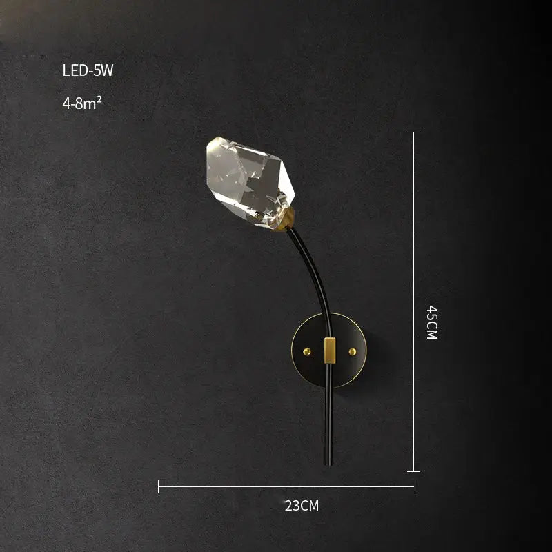 A modern black crystal copper chandelier wall sconce with faceted clear crystal bulb and gold-toned accents for dining room decorbites black crystal