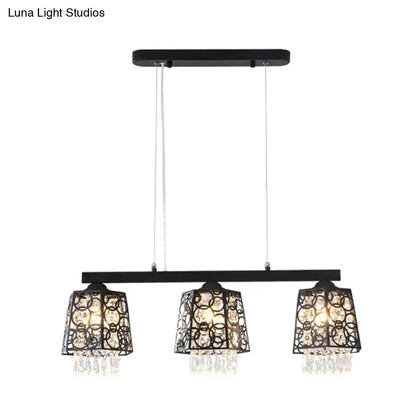 Modern black crystal droplet chandelier light fixture with three ornate crystal-encrusted shade shapes and dangling crystals