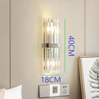 Modern black crystal led wall lights featuring clear crystal rods and sleek chrome accent bar for stylish bedroom decorbites crystal led