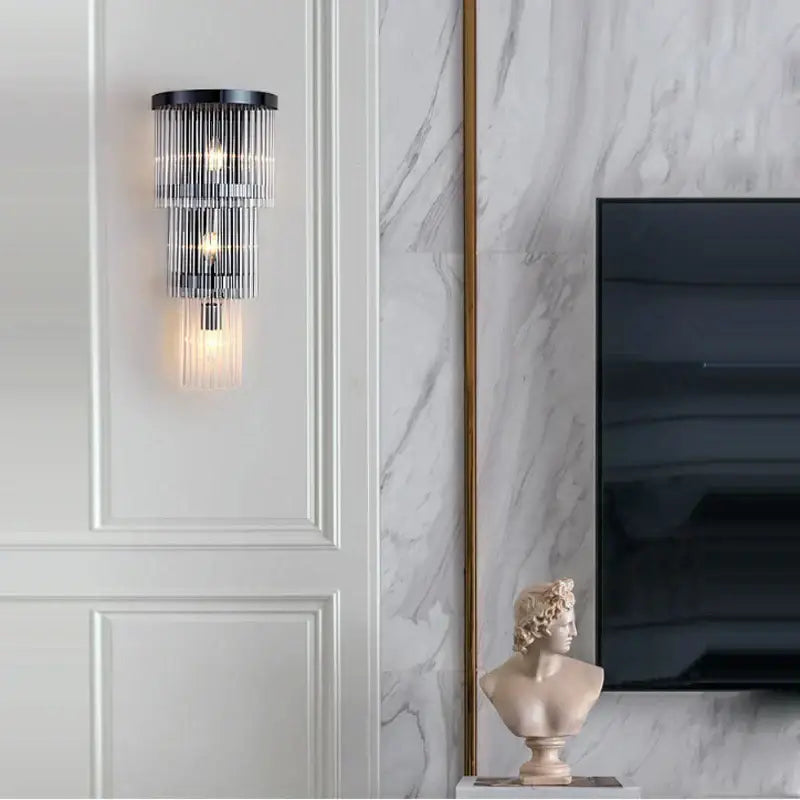 Modern black crystal wall lamp featuring cascading clear glass prisms as a stylish living room decorbites crystal wall lamp