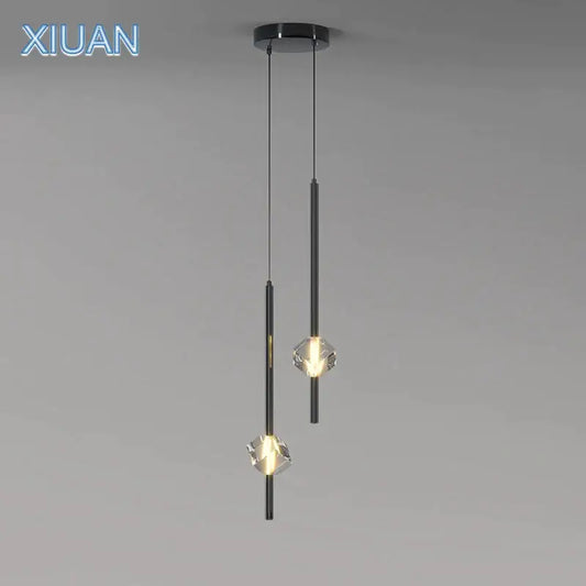 Modern black cube crystal pendant lamps feature crystal-like glass shades with sleek cylindrical metal rods for living room decorbites cube crystal lighting