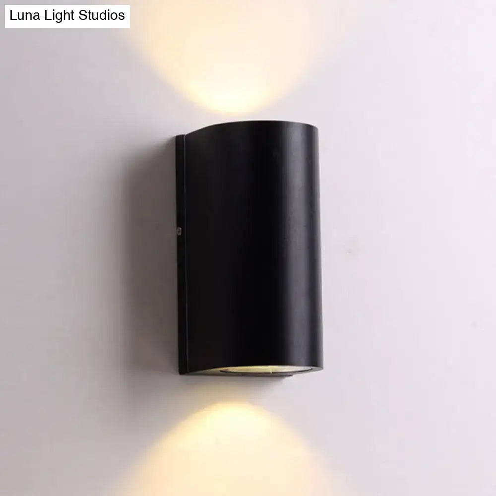 Modern black cube led wall sconce emitting warm light from top and bottom suitable for 110v-120v or 220v-240v use