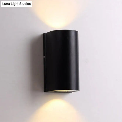 Modern black cube led wall sconce emitting warm light from top and bottom suitable for 110v-120v or 220v-240v use