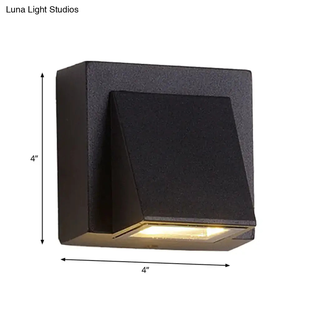 Modern black cube led wall sconce with matte finish and warm light suitable for 110v-120v outdoor use