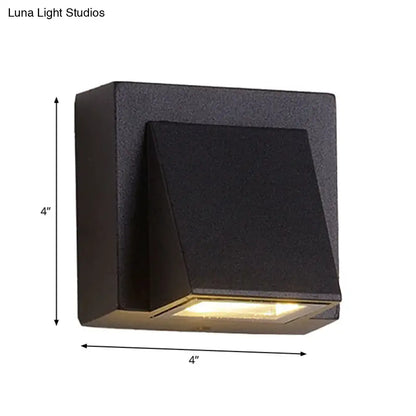 Modern black cube led wall sconce with matte finish and warm light suitable for 110v-120v outdoor use