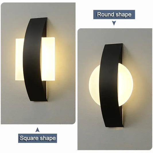 Modern black curved led wall light with square illuminated panels designed as a kitchen and dining wall lamp