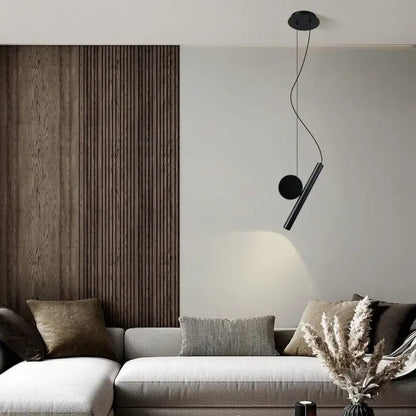 Modern black cylindrical led pendant lamp with sleek circular elements and curved cord for dining room decorbites adjustable led