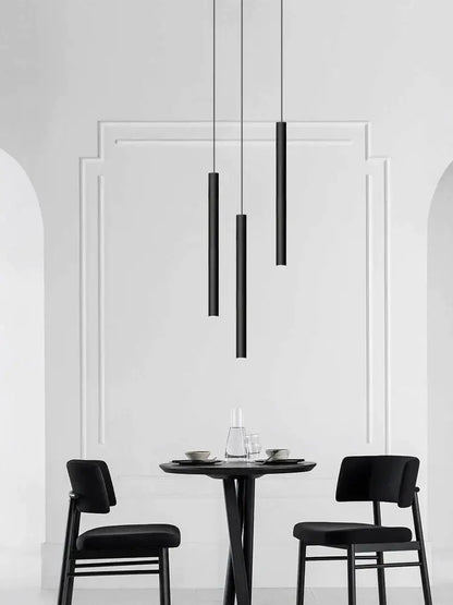 Modern black cylindrical led staircase chandelier suspension light features sleek matte decorbites cylindrical led pendants