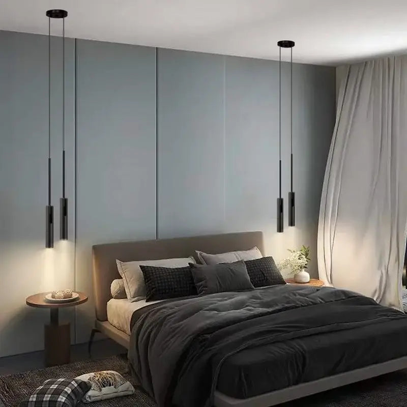 Modern black cylindrical pendant light with adjustable spotlight and matte finish ideal for bedroom decorbites black chandelier