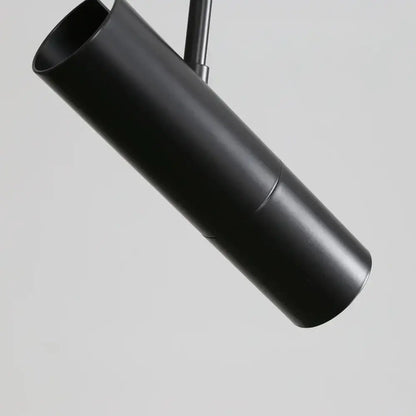 Modern black cylindrical pendant light with matte finish and adjustable spotlight ideal for bedroom decorbites black chandelier