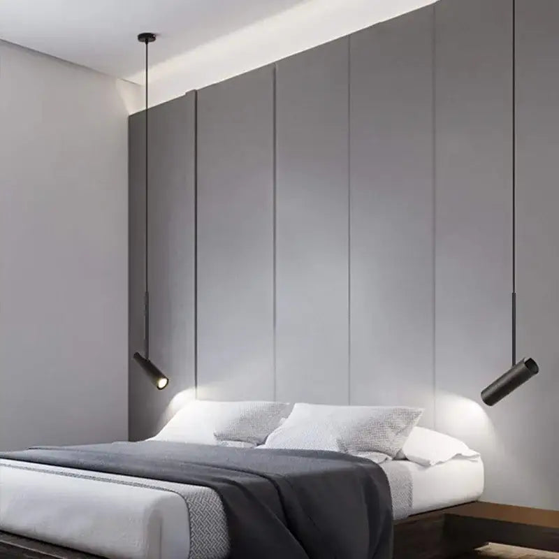 Modern black cylindrical pendant light with sleek design and adjustable spotlight for bedroom decorbites black chandelier