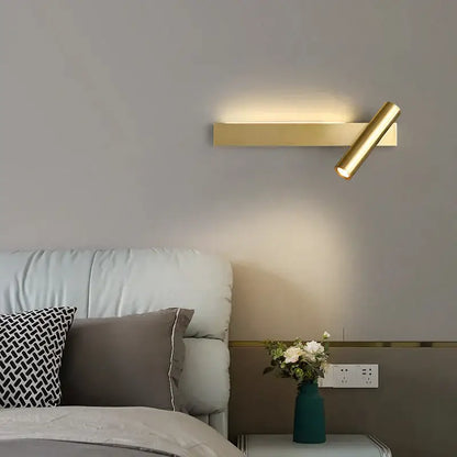 Modern black cylindrical wall light with gold-finished adjustable spotlight ideal for decorbites copper wall light decor
