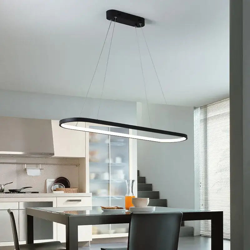 Modern black decorbites designer oval pendant lamp with sleek minimalist design and integrated LED lighting for dining room