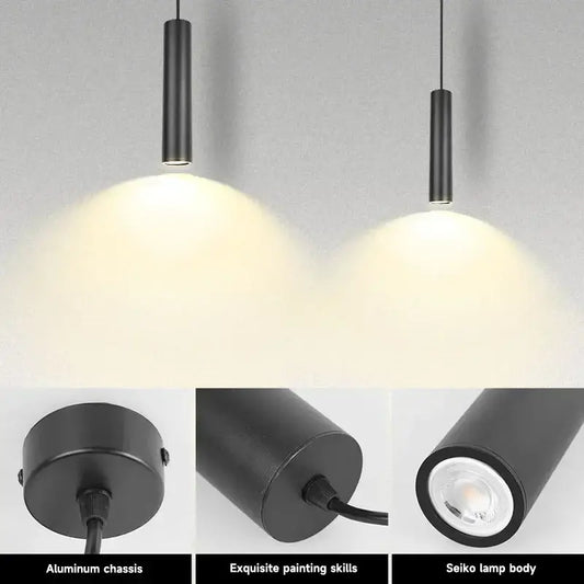 Modern black die-cast aluminum cylindrical pendant light with sleek aluminum chassis and warm focused illumination