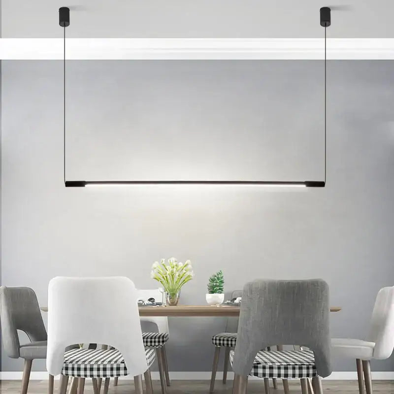 Modern black dimmable led pendant light by decorbites with sleek minimalist design hanging above dining room table
