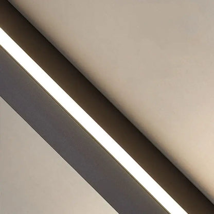 A modern black dimmable long wall lamp with a slim led strip light and warm white illumination for bedroom decorbites ambient lighting