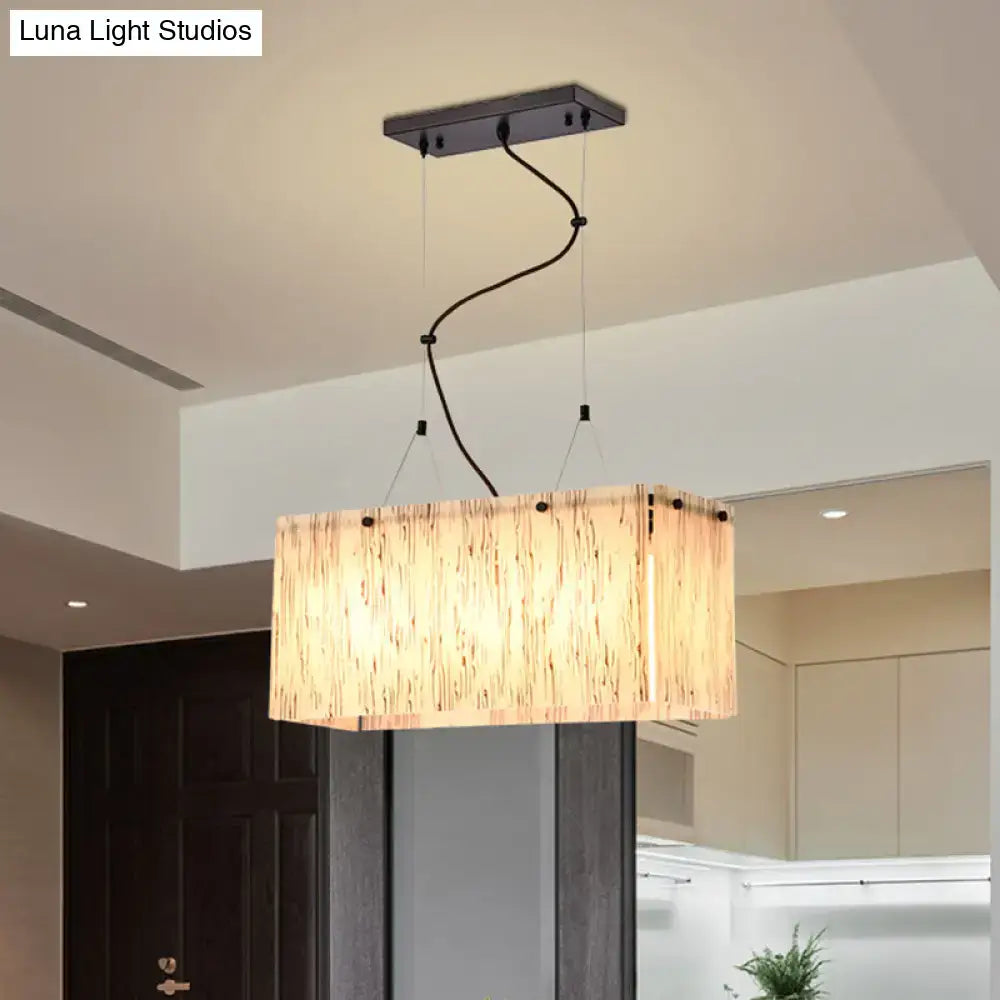 Decorbites modern black dining room island light fixture with rectangular amber glass shade featuring cord length and bulb base