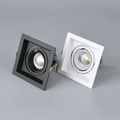 Modern black double ring led recessed ceiling light with square white spots and metallic accents for living room use