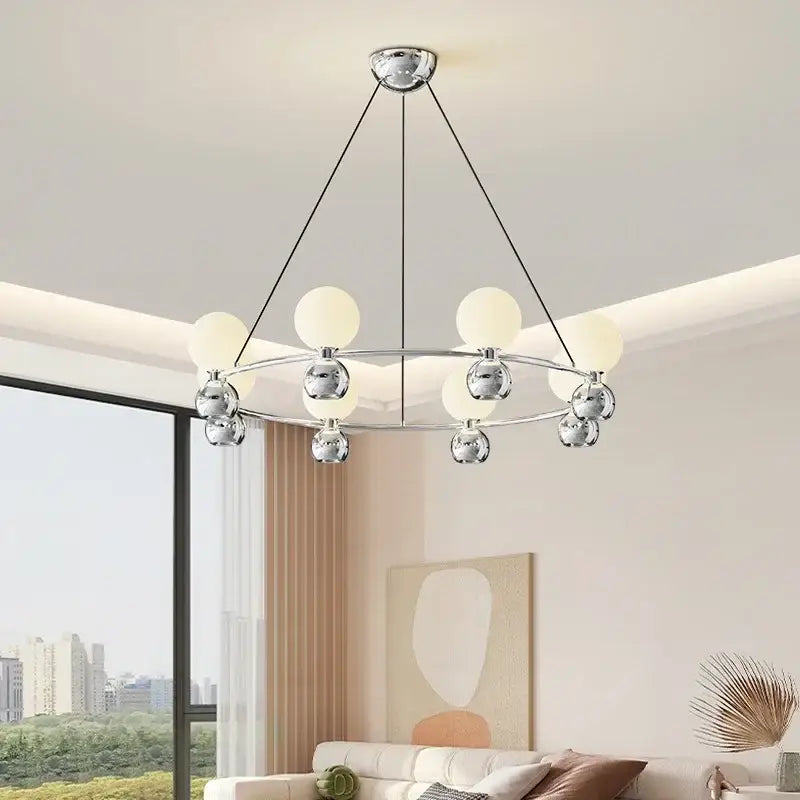 Modern black nordic pendant chandelier with eight spherical frosted glass shades and chrome details for living room use