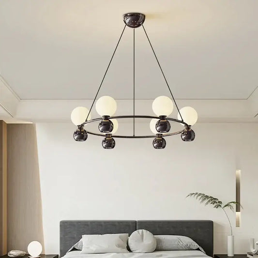 Modern black metal nordic pendant chandelier with eight frosted glass globes for living room lighting