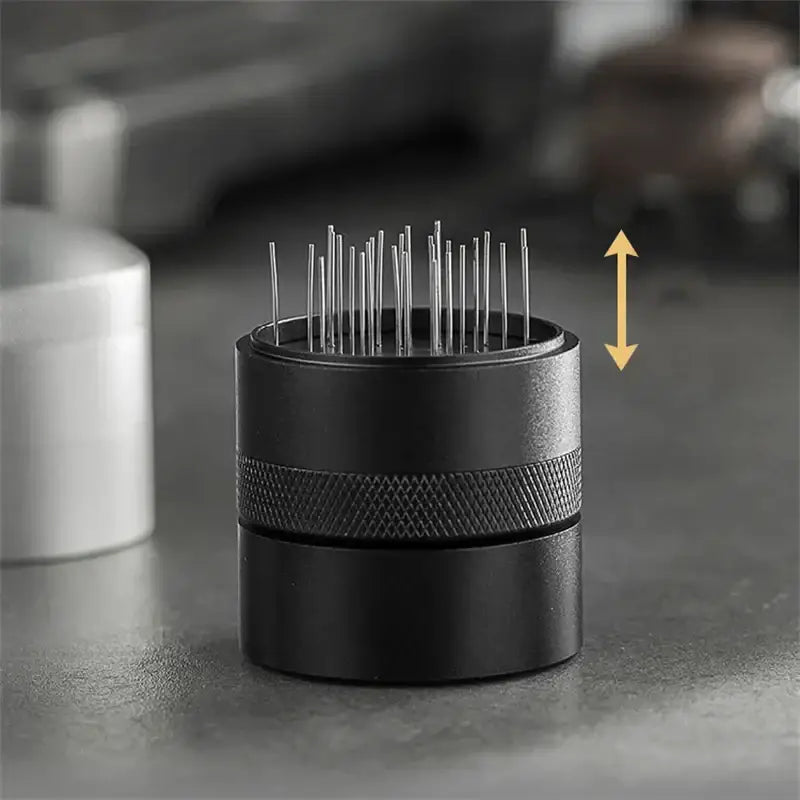 Modern black espresso needle distributor with textured grip and silver needles for coffee grounds by decorbites espresso needle