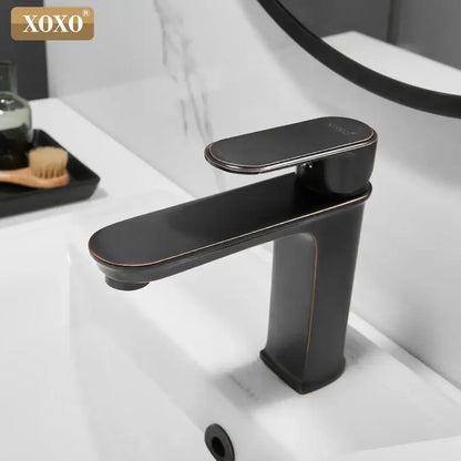 Xoxo modern basin faucet in black finish brass with brushed bronze accents for bathroom hot cold water mixer decorbites black finish
