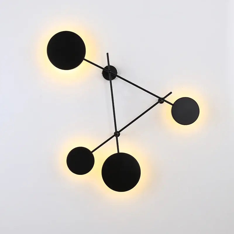 Modern black geometric iron wall lamp with glowing circular light fixtures for living room decorbites geometric iron wall