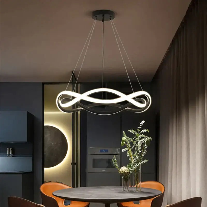 Modern black geometric led ring chandelier with sleek white led infinity loop and minimalist black metal frame for dining room decorbites black geometric