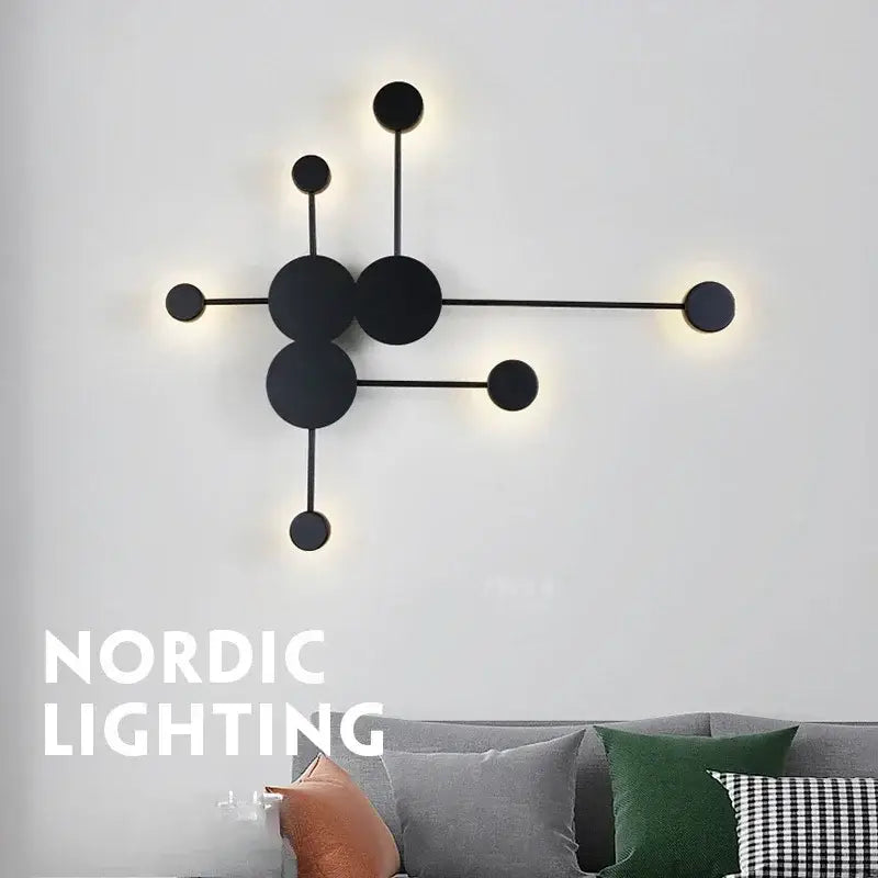 Modern black geometric led wall lamp with minimalist circular fixtures designed as a led wall sconce for bedroom use