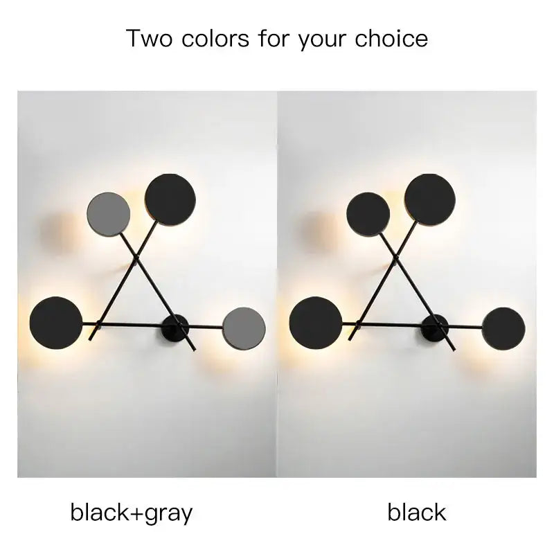 Modern black geometric led wall lamp featuring interconnected metal rods and circular discs for living room use