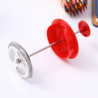 Red and silver pencil sharpener shown alongside modern black glass 350ml plastic coffee french press kitchen tool