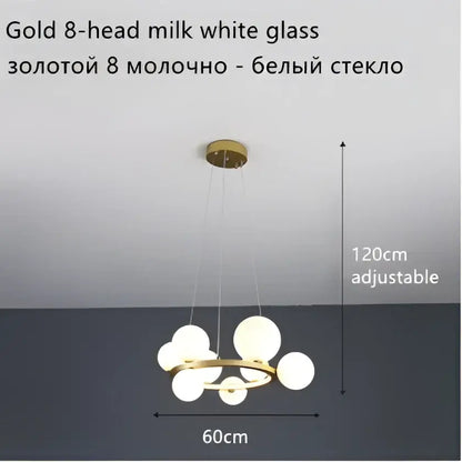 Modern gold-toned ball led chandelier with eight frosted glass balls suspended on a circular frame for dining room