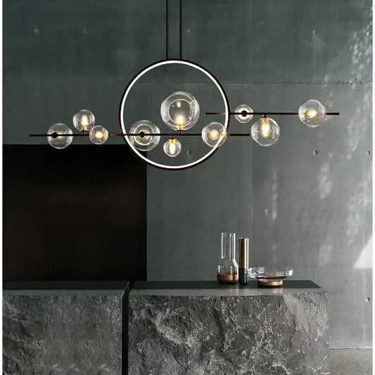 Modern black metal decorbites glass ball led chandelier with clear globe bulbs arranged circularly for dining room lighting