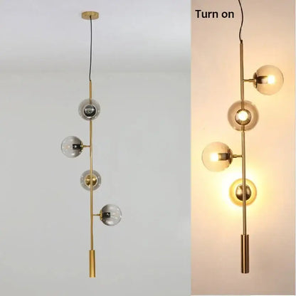 Modern black glass ball pendant light with gold-toned rod and clear and frosted glass spheres for living room decorbites chandelier